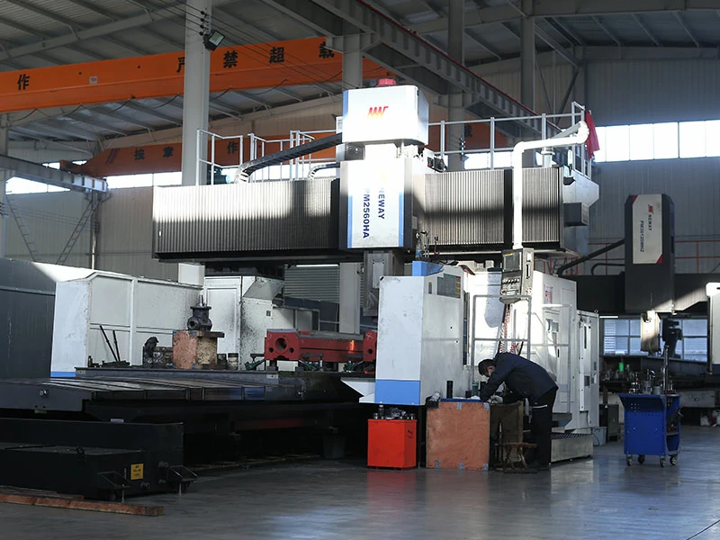 Overview of Ruicheng hydraulic press workshop showing gantry milling machine